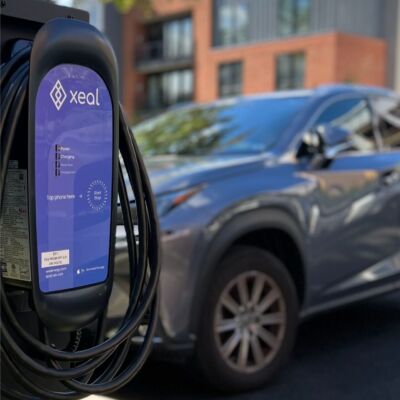 XEAL Charing Station Xeal charging unit in a modern home driveway, paired with smart scheduling and optimized for future proof charging needs