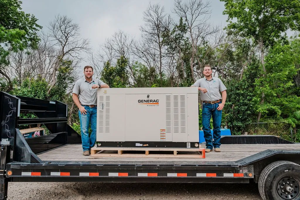 NZ8_4795-2880w A newly installed Generac standby generator at a commercial property, ready to provide backup power during an outage